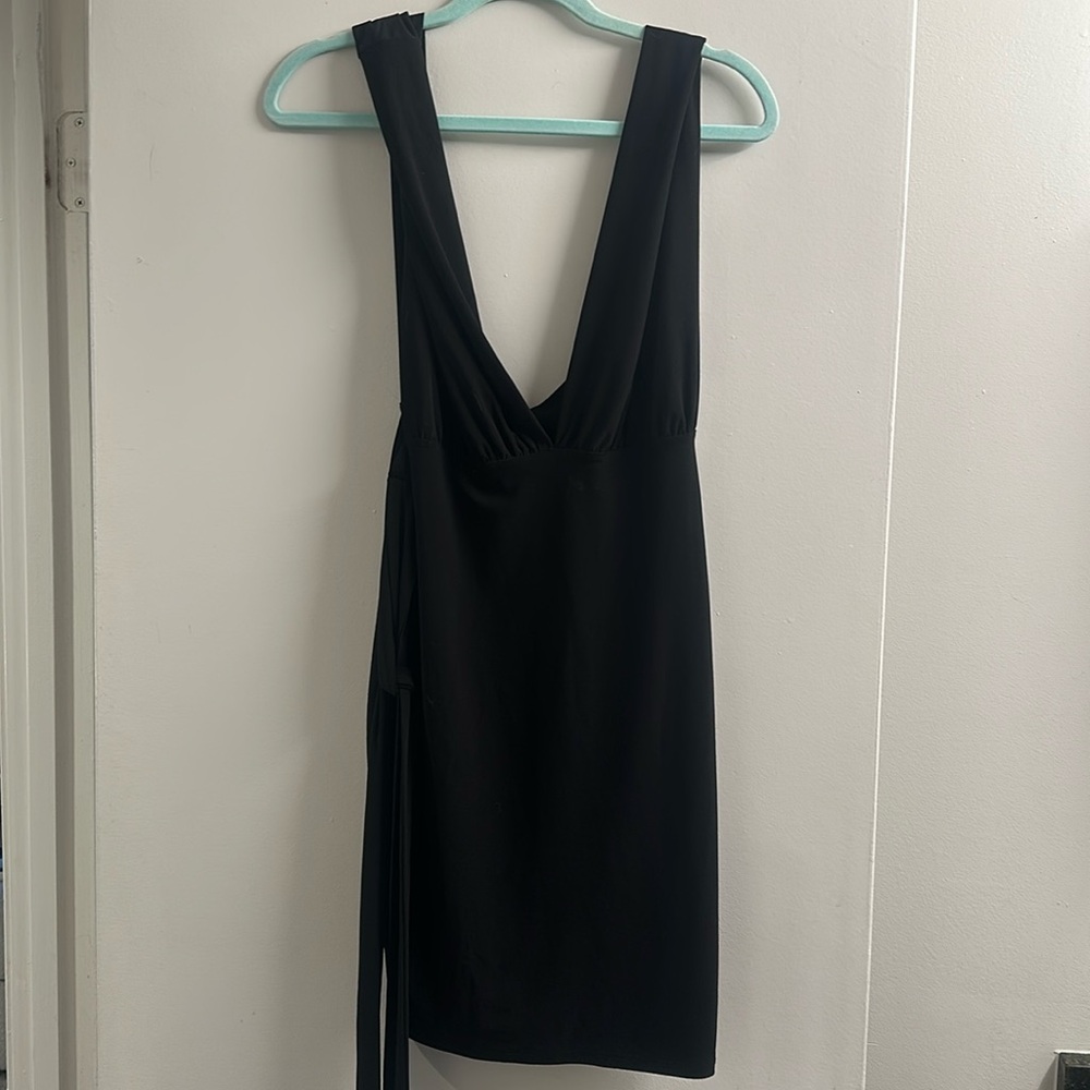 Gently worn going out little black dress. Minor stain that isn’t
Noticeable